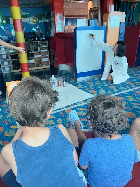 A back view of two boys at Kids Club.